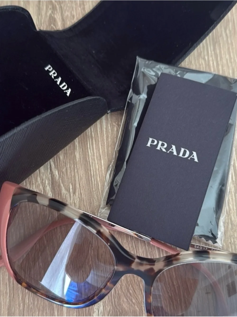 Prada Tortoiseshell Sunglasses with Pink Trim